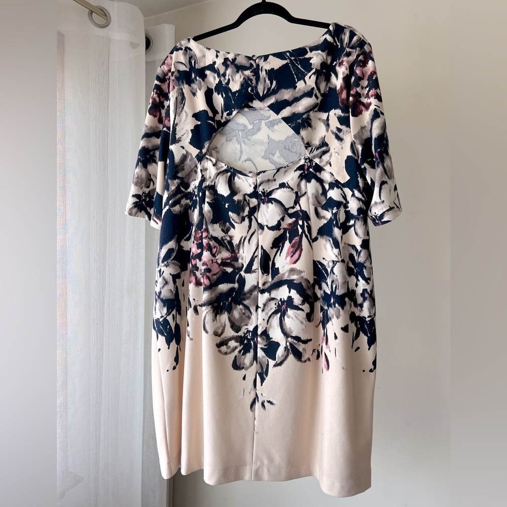 Taylor dress, peek-a-boo opening at back, 3 buttons and zipper, sheath